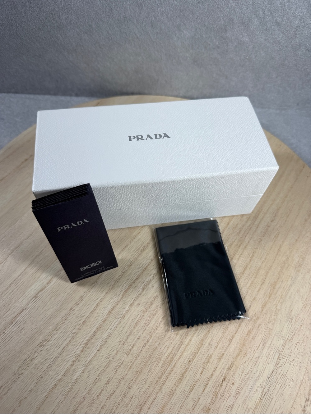 Prada White Presentation Box with Black Microfiber Cloth and Booklet